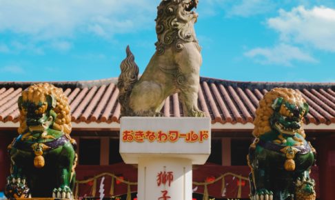 brown lion statue under blue sky during daytime